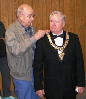 Coach (PER)Don Hoyer pinning jewels on ER J-Mo.  Tillamook Oregon Ritual Contest May , 2007