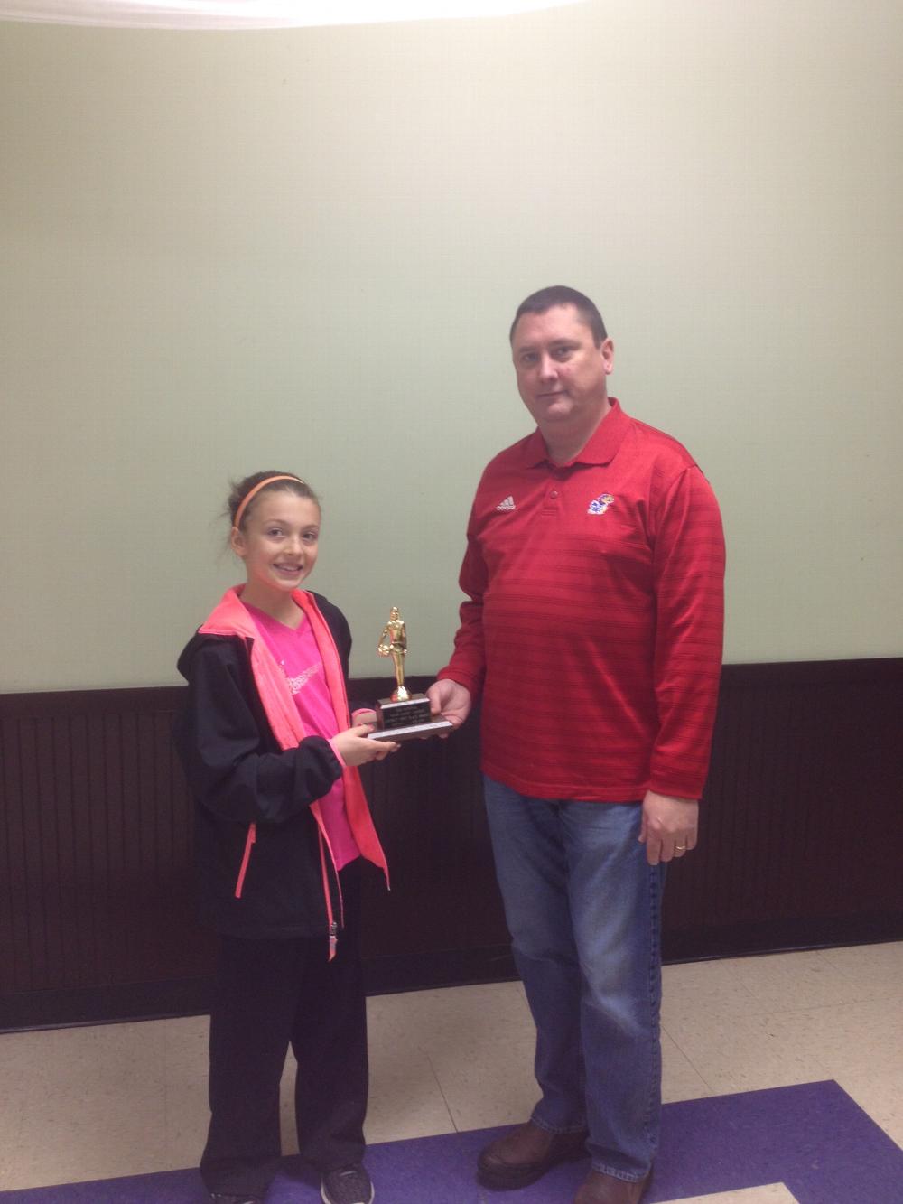 Madison Mills with her 1st Place trophy in 2015/2016 Farmington Elks shootout.