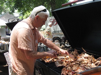 ANOTHER WONDERFUL ELK MEMBER "JAMES" HELPING SERVE THE WONDERFUL PIG - MEMORIAL DAY PICNIC BENEFIT 2012