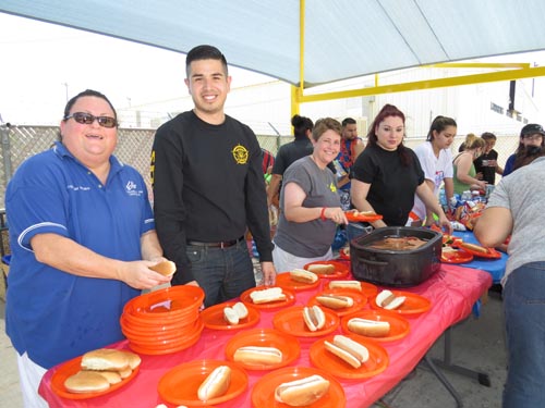 The Elks, with the help of the Hidalgo County Sheriff’s Office, provided a hot dog lunch and healthy watermelon dessert to the 140 plus kids in attendance. Pictured are Elks members Stephanie Helbig, Edgar Gomez, Exalted Ruler Glenda Greene and Leading Knight Julie Montenegro.