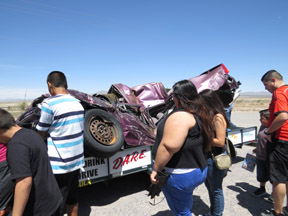 Students from Dugan Tarango Middle School check out the MADD vehicle.