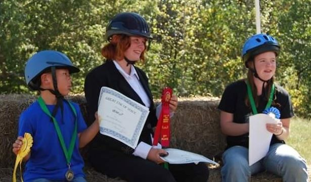 All students who participate in the Leg Up horse show receive recognition for their achievements. 