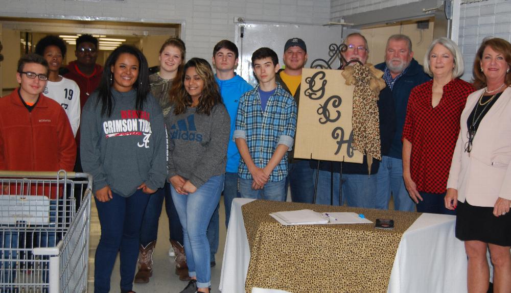 <b>Bill Roper, Katherine Roper, Dickey Watson and Cole Wade delivered food and personal items from our lodge to Giles County High School for this year's Backpack Program.</b>