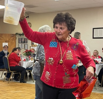 Joyce Bryant drawing the winners for money raised towards Scholarship Fund