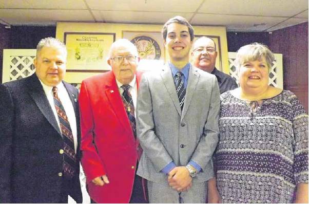 Elks Lodge initiation becomes family tradition.

Feb. 2015

MIDWEST CITY — One of Jack M. Roper’s proudest moments took place recently when he had the privilege of initiating his grandson, Jack Malm, into Midwest City Lodge No. 1890 of the Benevolent and Protective Order of Elks. 
 With this initiation, Jack M. Roper has had the privilege of initiating two sons, Jack Edward Roper and Scott Roper; a daughter, Melissa Roper Malm; a sonin-law, Dennis Malm; and grandson, Jack Malm, into the Lodge. 
 Roper was initiated into the Elks in 1971 at Pauls Valley and has been an active member ever since. In 1977 he transferred his membership to the Midwest City Lodge and served continuously as an officer until last year. 
 During those years Roper served as a member or chairman of virtually every working committee of the lodge and many at the state level. He served as exalted ruler, or president, of the Midwest City Lodge on three occasions. He was appointed to serve the Grand Lodge of the Order as district deputy in 1981. 
 Roper is a lifetime member of the board of the Oklahoma Elks Major Projects, a nonprofit organization dedicated to the betterment of all Oklahomans through educational and service grants. He is a two-term past president of the OEMP and served seven years as treasurer. 
 He carries the title of past state president, for he was elected to the office of presidentelect of the Oklahoma Elks Association in 2011 and served as president during the 2012-2013 fraternal year. He currently serves the Oklahoma Elks Association as state trustee-at-large. 
 Throughout all these years of involvement with the Elks, Roper has been supported by his wife, Margaret, who he says should be in the Guinness Book of Records as serving brownies and fried chicken to more Elks than anyone else. 
