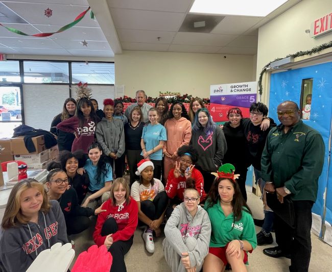 Elinore & Al Williams, Exalted Ruler, along with Elks Terreca & Bob Hurley presenting gifts donated by our lodge to the girls at Pace Center for Girls Clay. Elks Care, Elks Share.