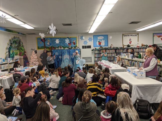 On December 28, our Lodge used a portion of the Beacon Grant to sponsor a Frozen Winter Carnival at the Green Cove Springs Library.  The event, geared towards children under the age of 6, featured crafts, games, ice cream, face painters, and story time with Elsa and Olaf.  Thanks to our many volunteers, the event was a great success, attended by 165 children and 135 family members. Each of the 165 children in attendance was gifted with a book of their own to keep.