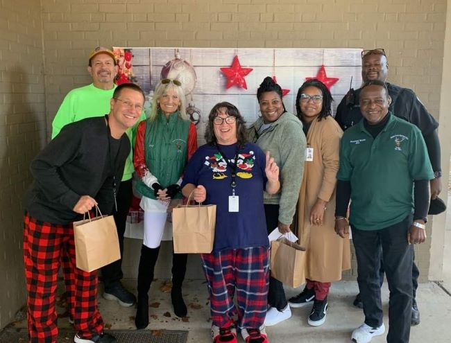 Delivering gift bags to the W.E. Cherry Elementary school - Assistant Principal Joshua Hogmire, PER Ed Weston, Lecturing Knight Joy Elrod, school secretary Michelle Solomon, teacher Michelle Mister, school staff member Shannon Scott, Exalter Ruler Al Williams, school resource officer Lester Booker