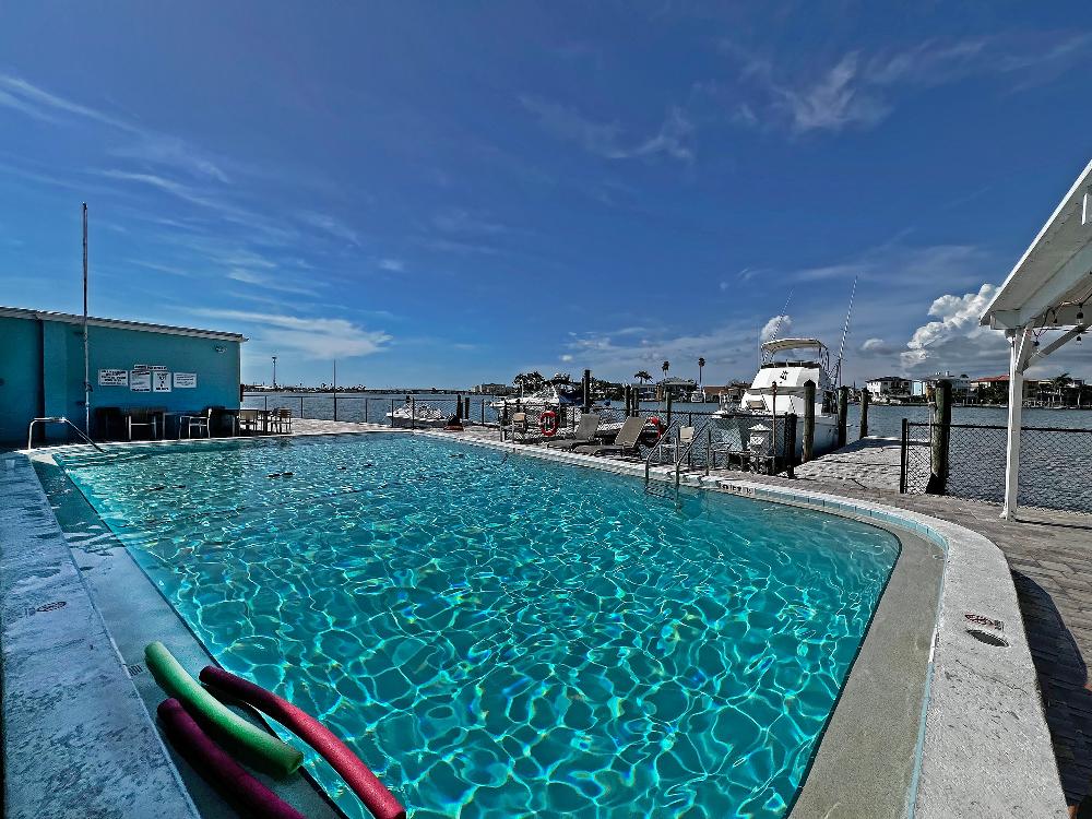 Waterfront Pool and view of docks.