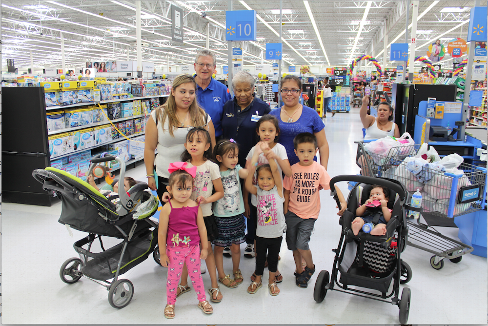 Aurora Elks Lodge #1921 went shopping for school clothes for six children (pictured) at a local Wal Mart.  This activity was made available with a Colorado Elks Association Clem Audin Grant.   Pictured are the six kids, Alondra, Aaliyah, Jazmin, Armando, Delayza, Amya and there moms Alexandra and Elizabeth.  Also pictured are  PDDGER/Secretary Thomas Welch and Wal-Mart Clerk clerk Ms Ida.