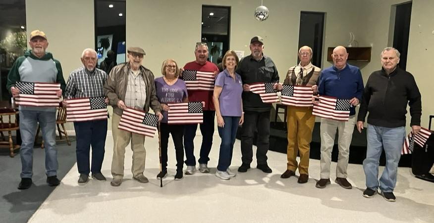 Tonight we celebrated our Veterans with dinner.
ER Rhonda McDonald presented them with a flag and we Thanked them for there service to our country and for our Freedom!
Pictured left to right . Jesse Pilch- Air Force-4 years,
Jefferson “Grumpy” Grant-Navy-3years, Kenneth Johnson-Navy-29years, Beth Carpenter-Navy-12 years, Angus Patterson-Army-28 years, ER Rhonda McDonald, John Barrack-Navy-3 years, Art Steinmyer-Army-3 years, Danny Crosby-Army-2 years, Allen Gustin-Army-2 1/2-years.
Not pictured: Richard Gest-Army/Navy-35 years, Bob Tiegs-Navy-8 years, Steve “Trouble”Cinader, Dennis Hinen