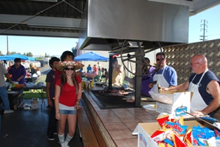 <b><center>Elk Members tending the grill.. Marc Curd PER and Lance Buck PER</b></center>