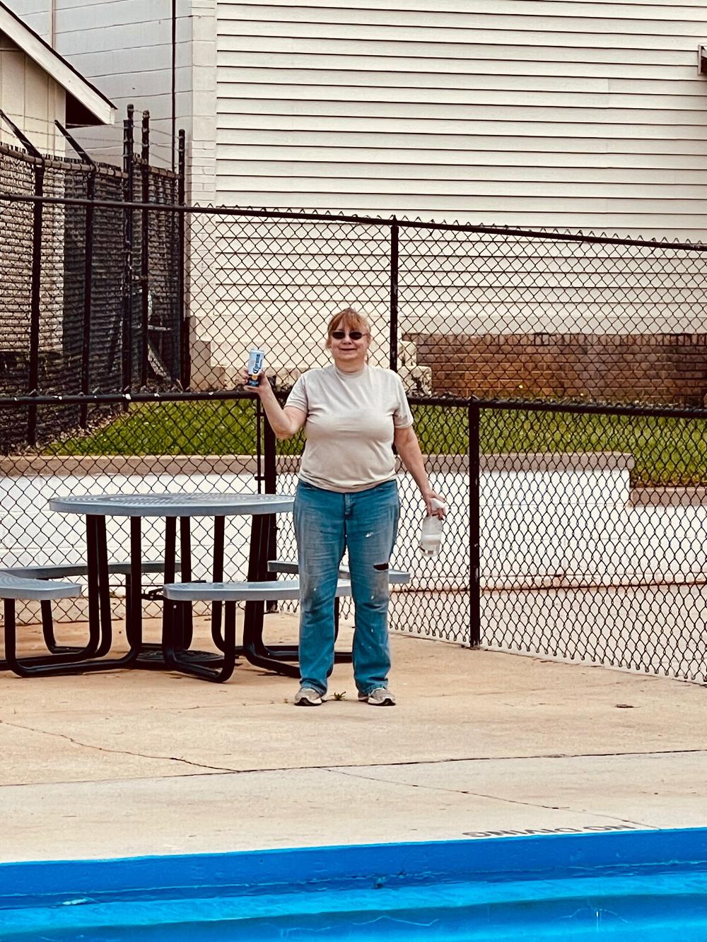 Pool Work Day April 15, 2023 - Lisa Dumire doing her part.