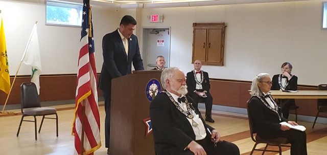 Assemblyman Jake Ashby addresses the Flag Day ceremony attendees including lodge officers, members and guests.