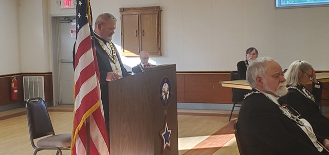 Exalted Ruler Brian Kirch addresses the Flag Day ceremony attendees including lodge officers, members and guests.