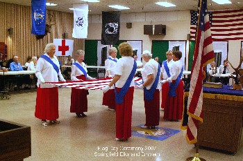 Emblem Club #506 performing the flag folding ceremony at the Springfield Elks Flag Day ceremony.