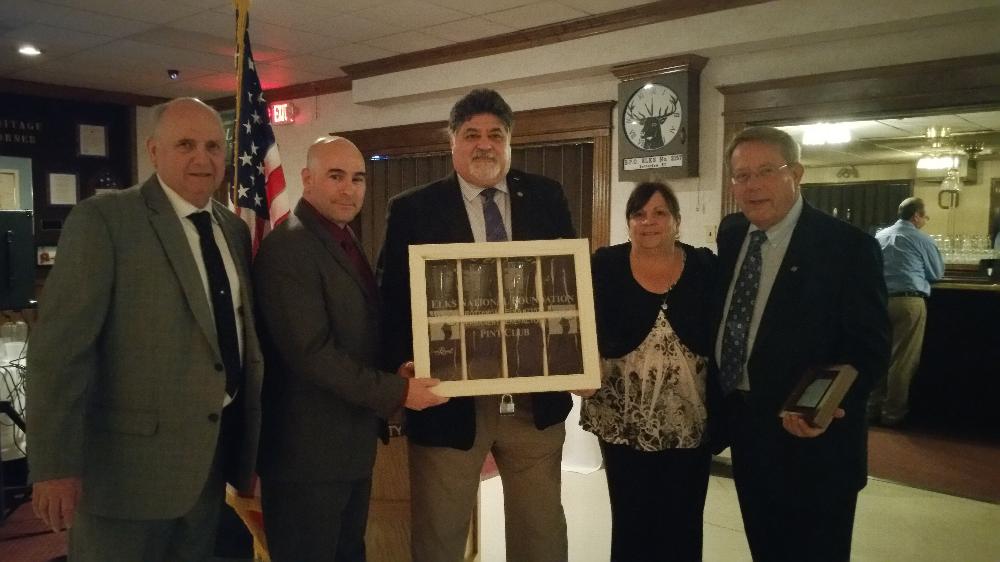 DDGER ED QUACKENBUSH, PDDGER MEL OLIVEIRA, PSVP PEDRO ROSA, PATTY GARDNER, & BRONZE LEVEL PERMANENT BENEFACTOR PAUL HARIZOMOWITZ INTRODUCE THE ROTTERDAM ELKS ENF PERMANENT BENEFACTOR PINT CLUB.