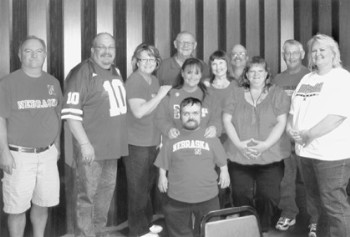 We had an unexpected, but pleasant visit from State President Don Gatzke and his wife,
Peg, for the Nebraska vs Texas game. Although the outcome was not what we wanted,
everyone had a good time and the food was great. In the photo, members present to watch
the game and enjoy the fellowship, (l-r) Troy Hayes, Rod Deuel, Annette Grummert, Don
Gatzke, Missy Warren, Craten McKee, Peg Gatzke, Grove Dalton, Bobbie Dalton, Arlo
Schoenrock, Cathy Martin.

