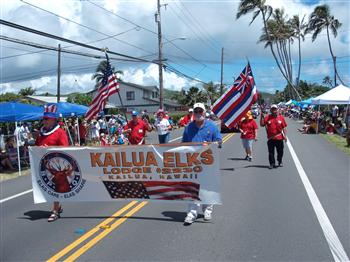 Marching down main drag in Kailua 4th of July Parade (July 4th, 2011). Team finishes "Best In Show"!! Da!! Easy choice!!