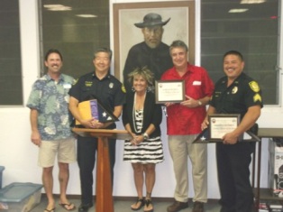 Greg and Tom with Wayne Masuda (Fireman of year), Sgt Duane Samson (police officer of year) and Avis Kalama of Windward Spouse Abuse Center