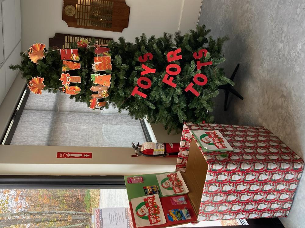 Our Seasonal Tree in our Members Lounge Lobby is Up and ready . Promoting  Thanksgiving and Toys For Tots Donations of New Toys  are Welcome!