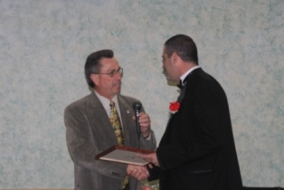 Middlesex County Freeholder Ronald G. Rios presents ER Elect Angelo Golino, Jr. with a Proclamation.