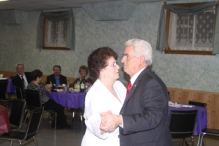 Exalted Ruler Angelo Golino's parents enjoy a proud dance as their son is installed.