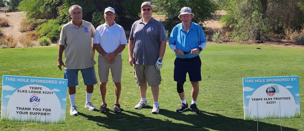 Team at hole sponsored by Tempe Elks Lodge & Trustees