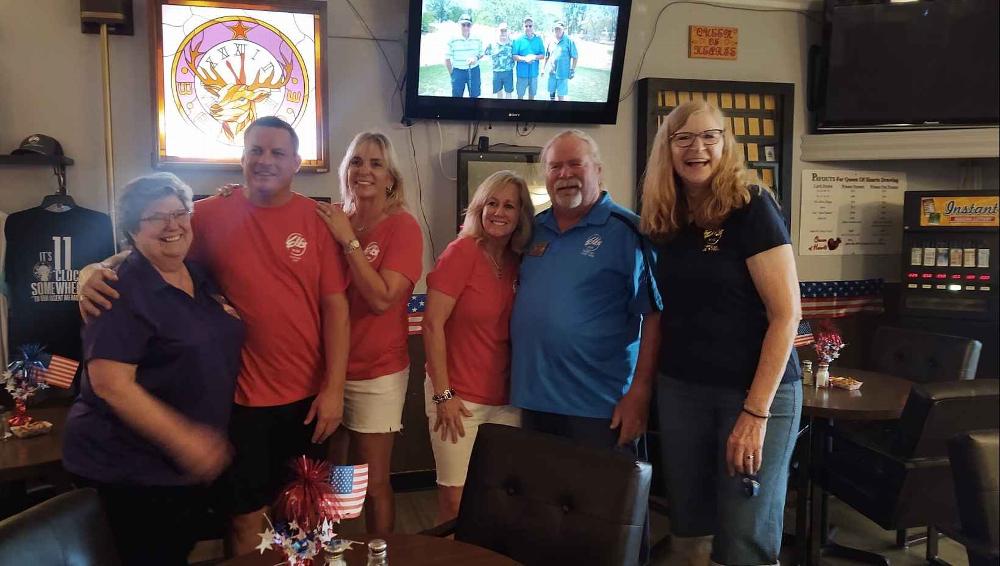 Kathy Laird, ER Marty Laird, and Connie Schultejans greeting a few of the Lodge Crawl participants from Scottsdale Elks Lodge #2148. We presented them with a $140 donation from a 50/50 raffle we had for their charity, "Limbs of Dreams Foundation".