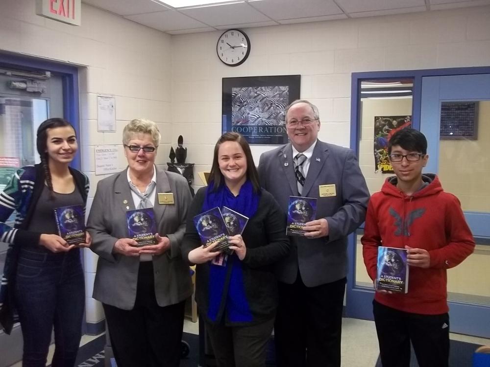 The Exalted Ruler Art Munin assisted by the Chaplain Patricia Carstens of Oak Lawn Elks 2254 presented 168 dictionaries to the President of the National Junior Honor Society, President of Student Council, & their teacher Mrs. Maggie Omiecinski" at Simmons Middle School.