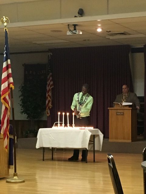 Tiler, Wilford Davis lights the candles for our members that passed in 2016 during the Memorial Ceremony held on Sunday, December 4, 2016. 