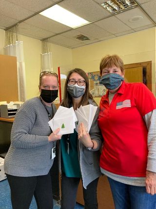 Using funds from the Beacon Grant, $1000 in gift cards was presented to the Hackettstown Middle School to give as Christmas gifts to children in their Title 1 program.