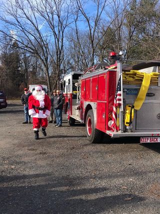 Santa arrived by fire truck to visit with the children at Breakfast With Santa.