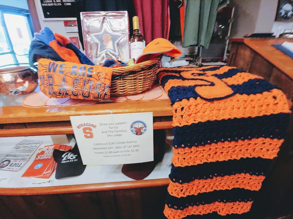 Show your  SU colors and support your Lodge Raffle. SU paraphernalia and a hand crocheted  afghan were raffled to aid our maintenance fund. Items were generous gifts from Lodge members (11/29/19)