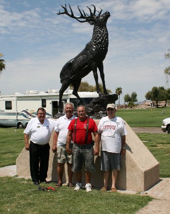 The Lake Havasu Elks PER association  replaced a badly deteriorated fiberglass elk that had graced the local cemetery for years. The new elk is cast aluminum and should stand the test of time. Pictured from left: Larry O. Lee, Dennis Dunkirk, “Pooch” Piche, Bart Sherwood