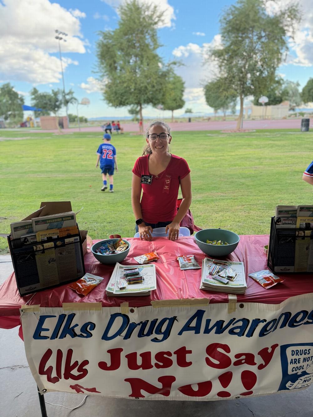The Bullhead City Elks Drug Awareness Chairman Sarah Valle setting up her booth for the Walk away from Drugs Event Thursday October 22 2026