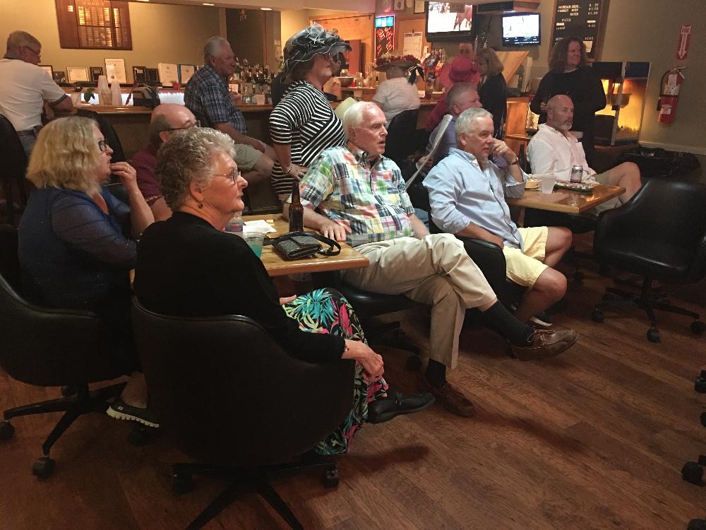 Lodge members watching the Kentucky Derby on tv