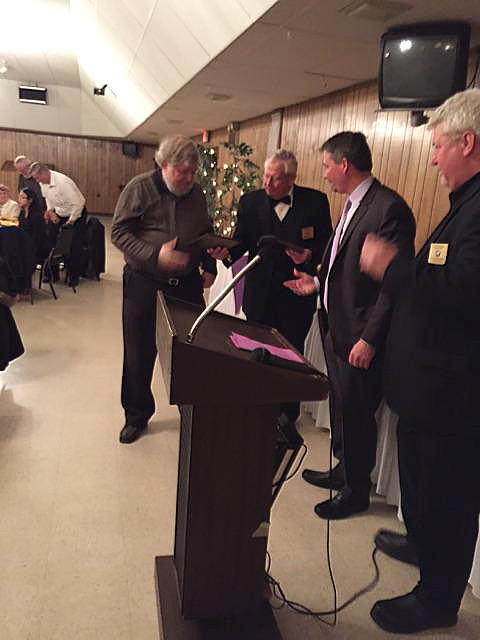George Messmore and Pat Bozell accepting their Elk of the Year Award 