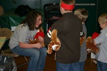 Build a Bear Helper Sam - helping kid's tie on their bows.