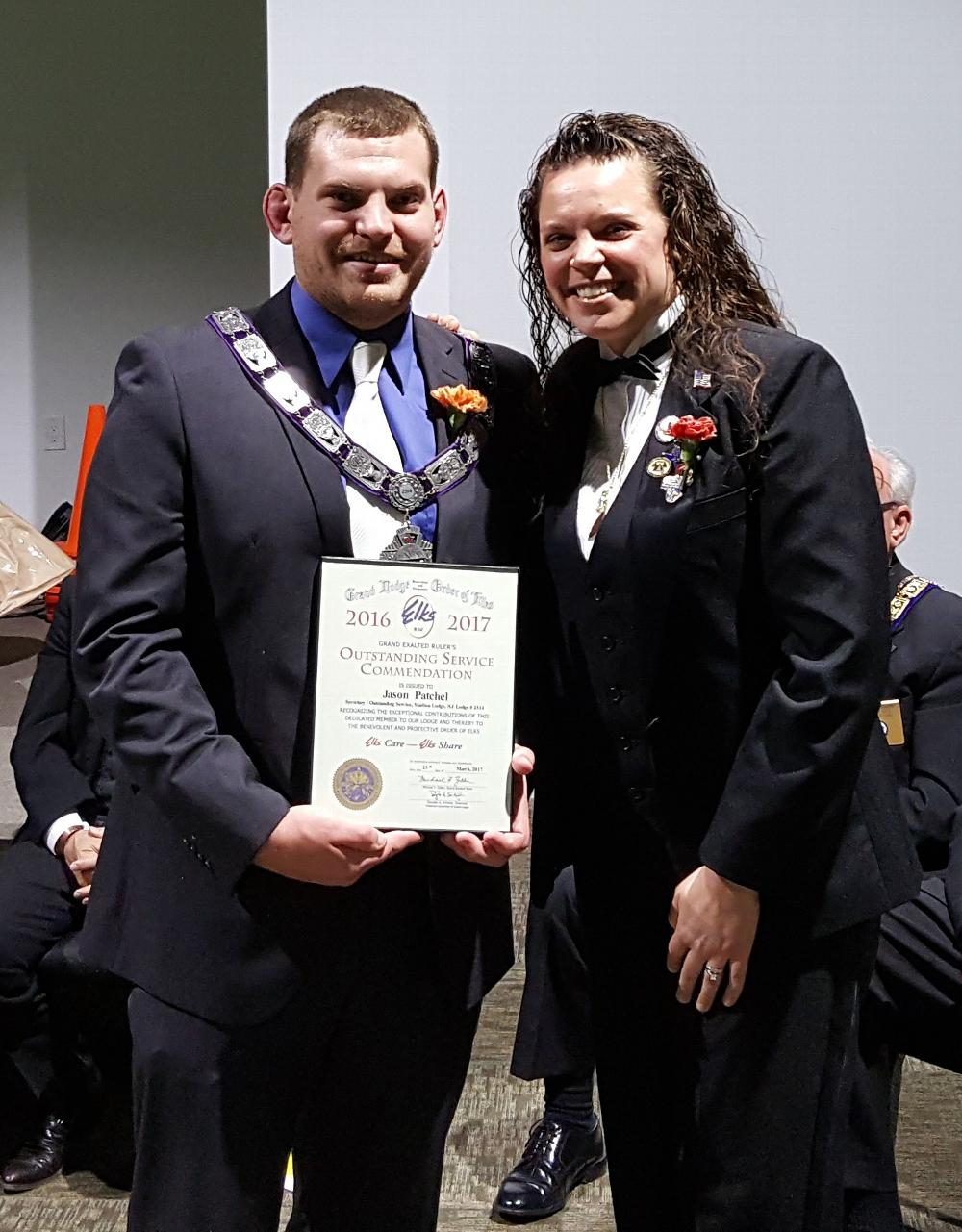 Jason Patchel receives an Outstanding Service Commendation from Exalted Ruler Allison.