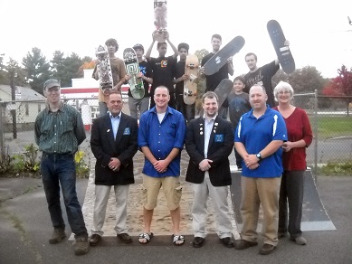 October 2014. Montague Elks donates $2,000 Gratitude Grant to help build a permanent concrete skatepark at Unity Park.
Lecturing Knight Paul Cloutier (left) and Exalted Ruler Jacob Rose are pictured with Montague Selectman Michael Nelson (center), Montague Parks and Rec director Jon Dobosz (right), members of the skatepark committee and community.