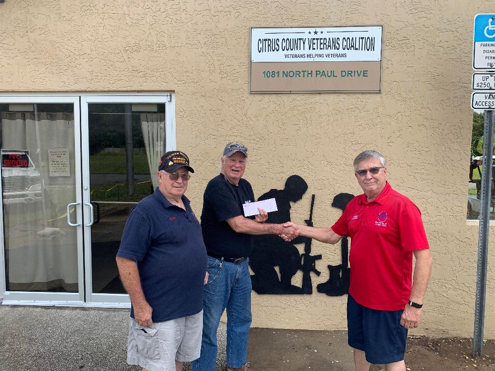 Bob Bendle and Richard Floyd from the Citrus County Veterans Coalition receiving the $2500 Freedom Grant check from ER Richard Grosnick. The funds will go to support the Veterans Foodbank, located here in Hernando.