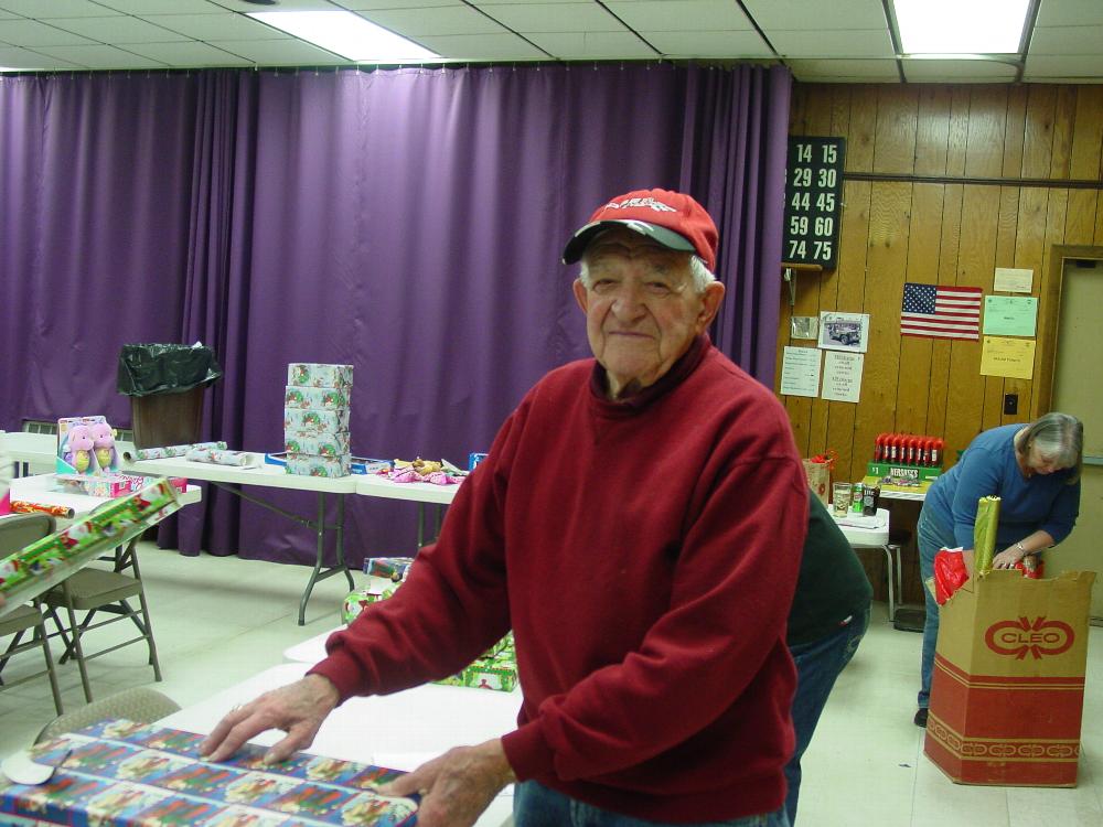 Santa's Helpers were busy last week wrapping up gifts for our "Kids Christmas Party" with Santa.  Great job helpers!