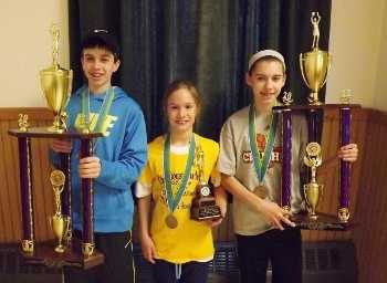 Three local youngsters won Maine State Hoop Shoot championships in their age division at Bangor High School on Jan. 27, 2013. Colby Esty, sponsored by the Skowhegan-Madison Lodge, also won the Amos A. McCallum Outstanding Shooter award in the boys’ division for the second year in a row, and Sydney LeBlanc, also sponsored by the Skowhegan-Madison Lodge, captured the Alan W. Richard Outstanding Shooter trophy in the girls’ division. Jaycie Christopher (center) won the Girls Age 8-9 championship.