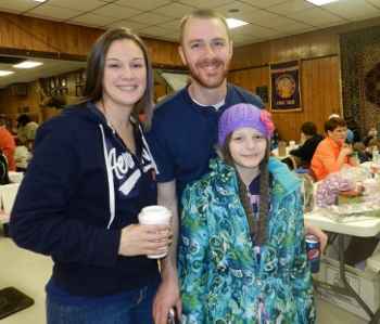 More than $6,000 was raised to help young cancer patient Mikayla Violette at a Feb. 23, 2013 Luck of the Draw auction at the Skowhegan-Madison Elks Lodge. More than 200 people participated, and the community support was overwhelming. Mikayla is pictured with her dad J.J. and stepmom Erica.