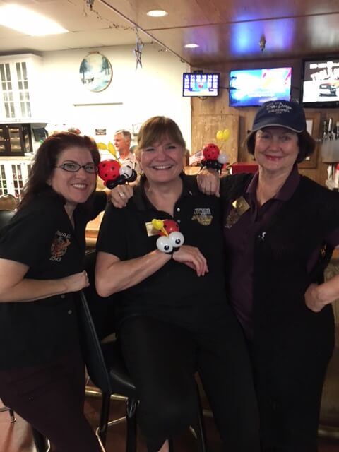 Julie Clemmons - Esquire, Janet Rasmussen PDDGER ER, and Diane Sharp - Trustee having some fun with the shaped balloons at the April 2018 Family, Food, Fun Day at the Lodge.