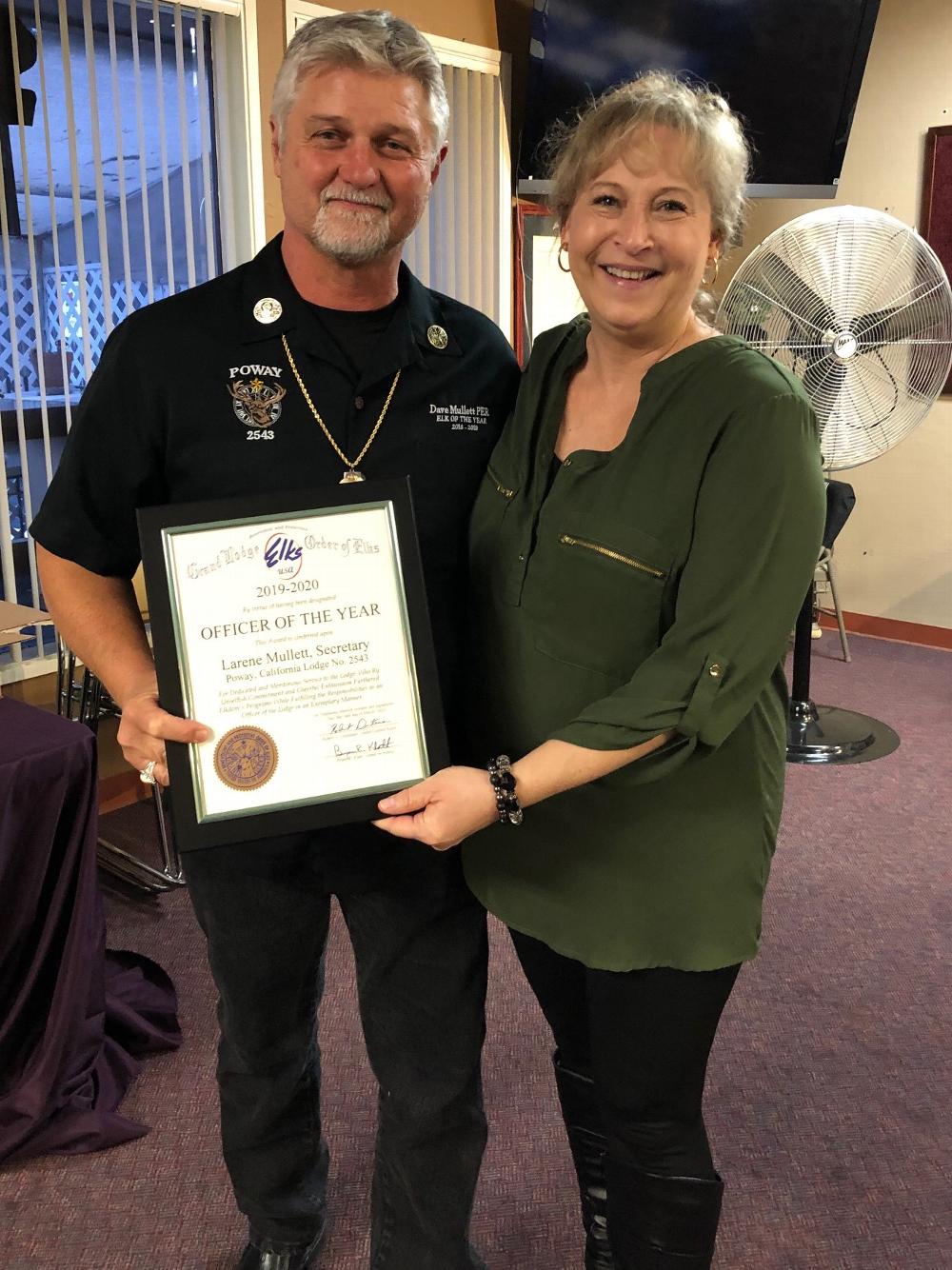 ER Dave Mullett, PER presenting the Lodge Secretary, Larene Mullett, with the Officer of the Year Award. 3.14.2020