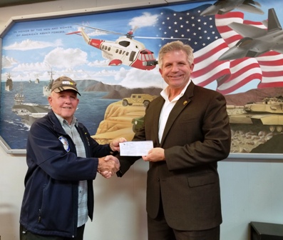 Poway Elk member, Ed Berger, presenting a Freedom Grant donation check to North County SD StandDown Chairman, Matt Foster October 2017