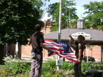 Flag Day Ritual - Lapeer County Sheriff's Department Explorers prepare to raise the flag.