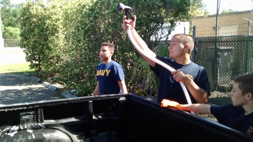 The Sea Cadets washed a lot of cars and trucks and even a motorcycle.  Their goal was to raise $500 but raised over $1,000!